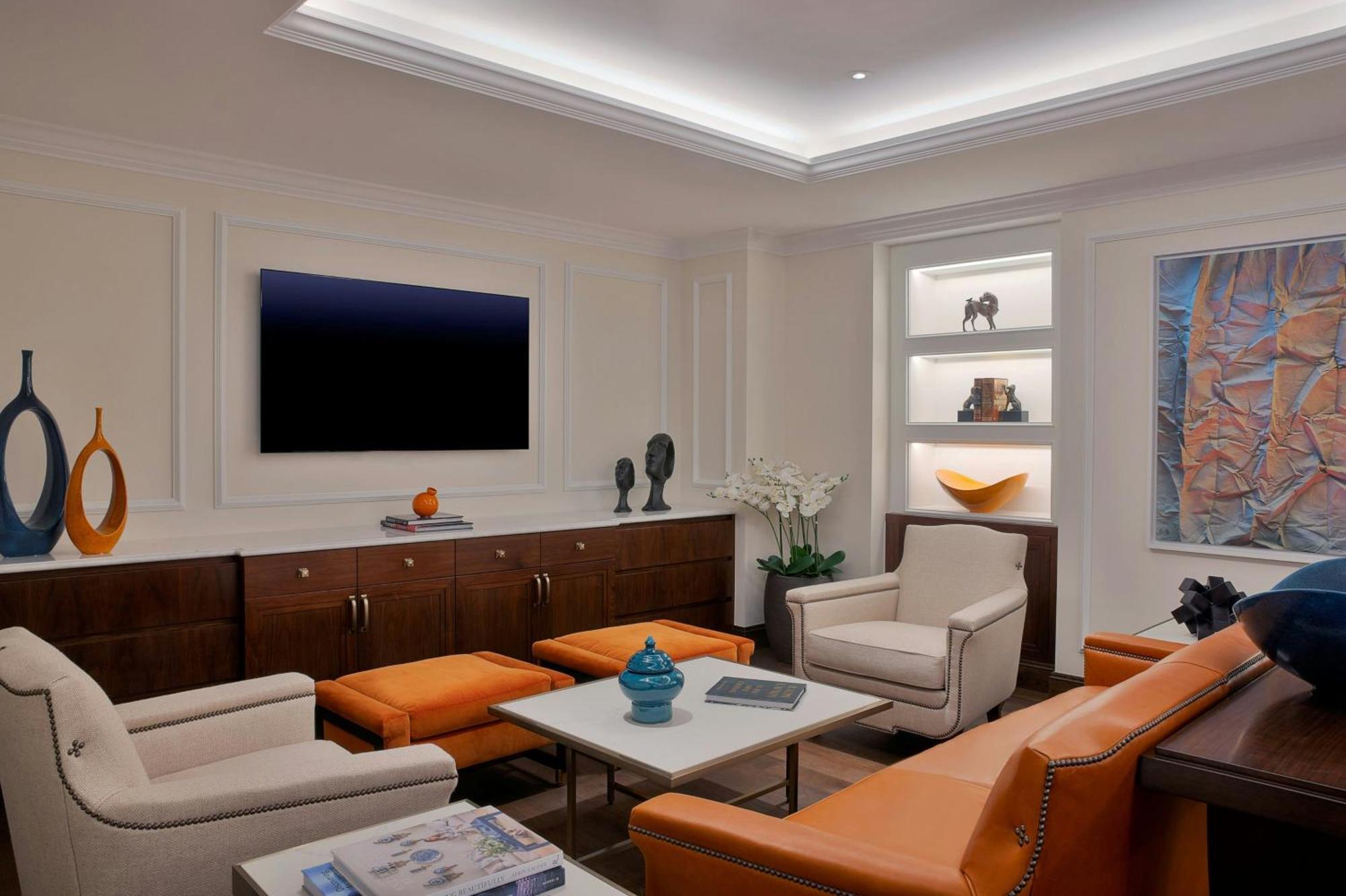 The Ritz-Carlton, Amman Hotell Exteriör bild A living room with indirect lighting